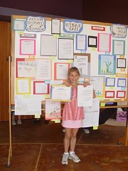 Ashley poses with her poem